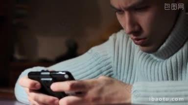 年轻人在游戏机上玩视频射击滑块油门
